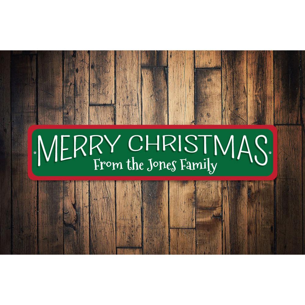 A festive Christmas Sign featuring vibrant colors and a cheerful message, perfect for holiday decorations.