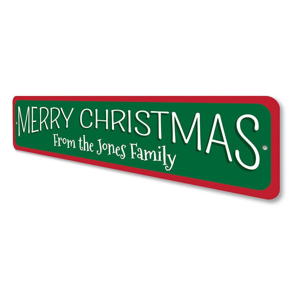 A festive Christmas Sign featuring vibrant colors and a cheerful message, perfect for holiday decorations.