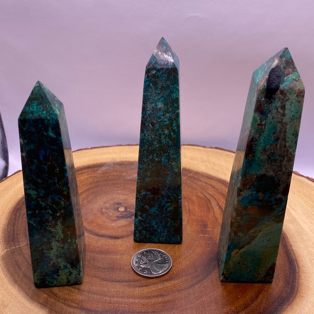 A polished Chrysocolla Obelisk showcasing vibrant teal blue-green colors and unique swirls, perfect for meditation and healing.