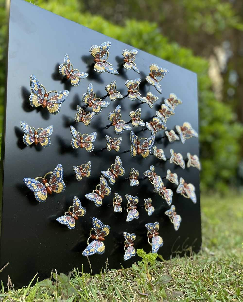 Circle of Butterflies Wall Art featuring midnight blue butterflies arranged in a circular design, handmade by Keren Kopal.