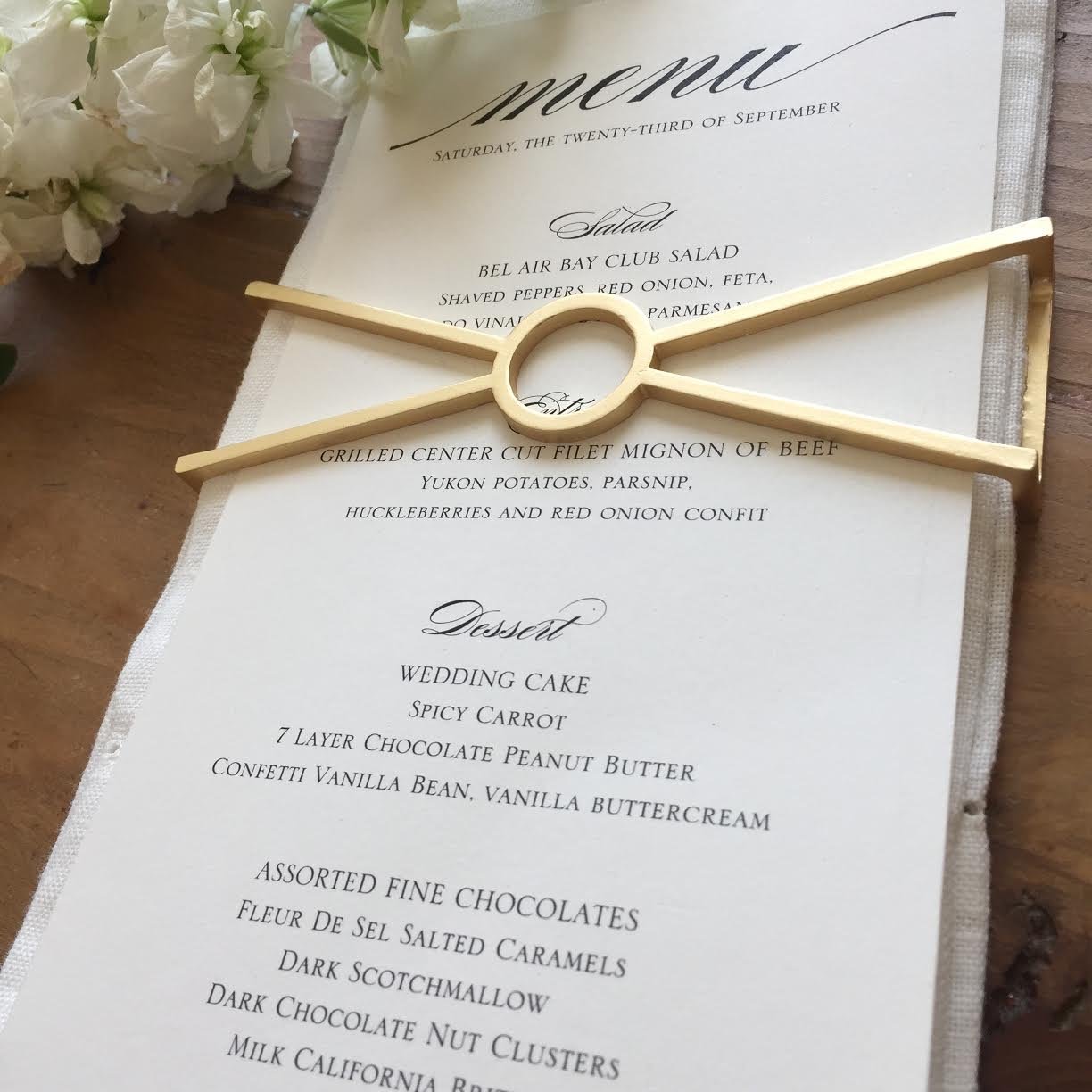 Circle X Wrap SET(4) in Matte Gold, elegant napkin wraps displayed in a stylish box.