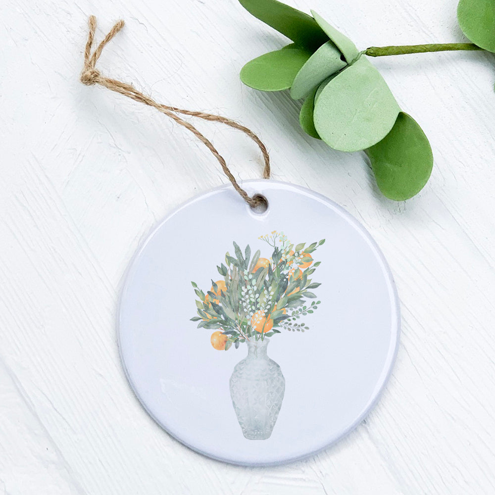 A beautifully crafted Citrus Vase ornament made of high-quality porcelain with vibrant designs, perfect for home decor or gifting.