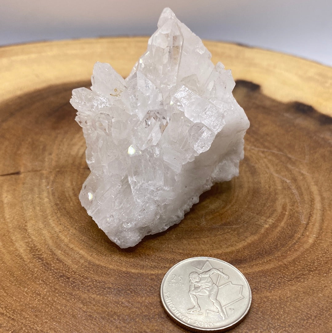 A beautiful arrangement of Clear Quartz Clusters showcasing their natural formations and sparkling clarity.