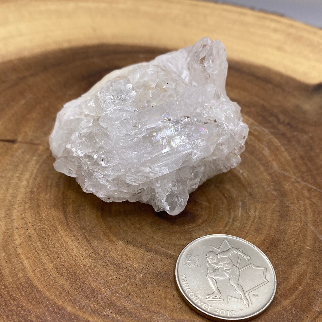 A beautiful arrangement of Clear Quartz Clusters showcasing their natural formations and sparkling clarity.