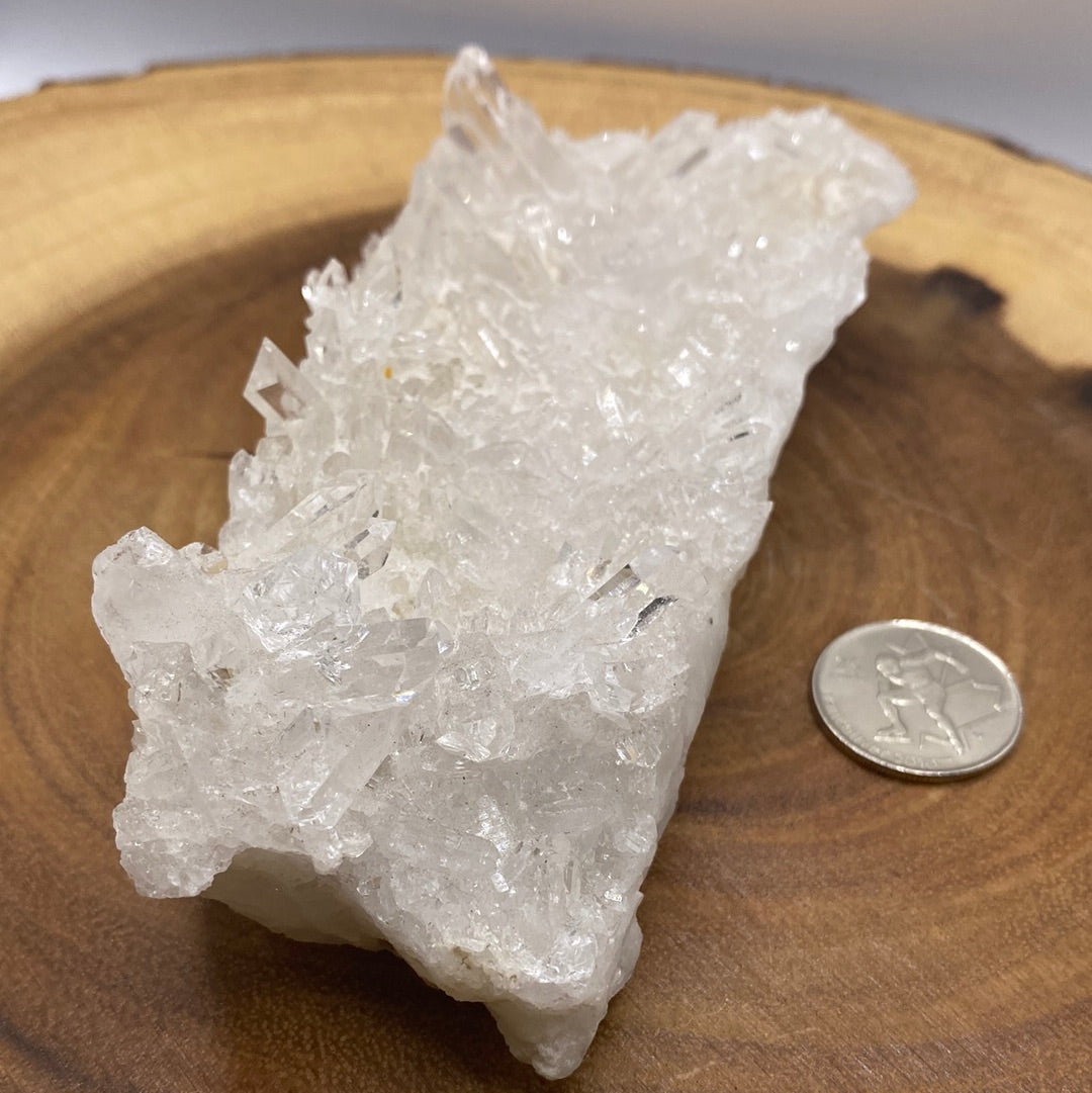 A beautiful arrangement of Clear Quartz Clusters showcasing their natural formations and sparkling clarity.