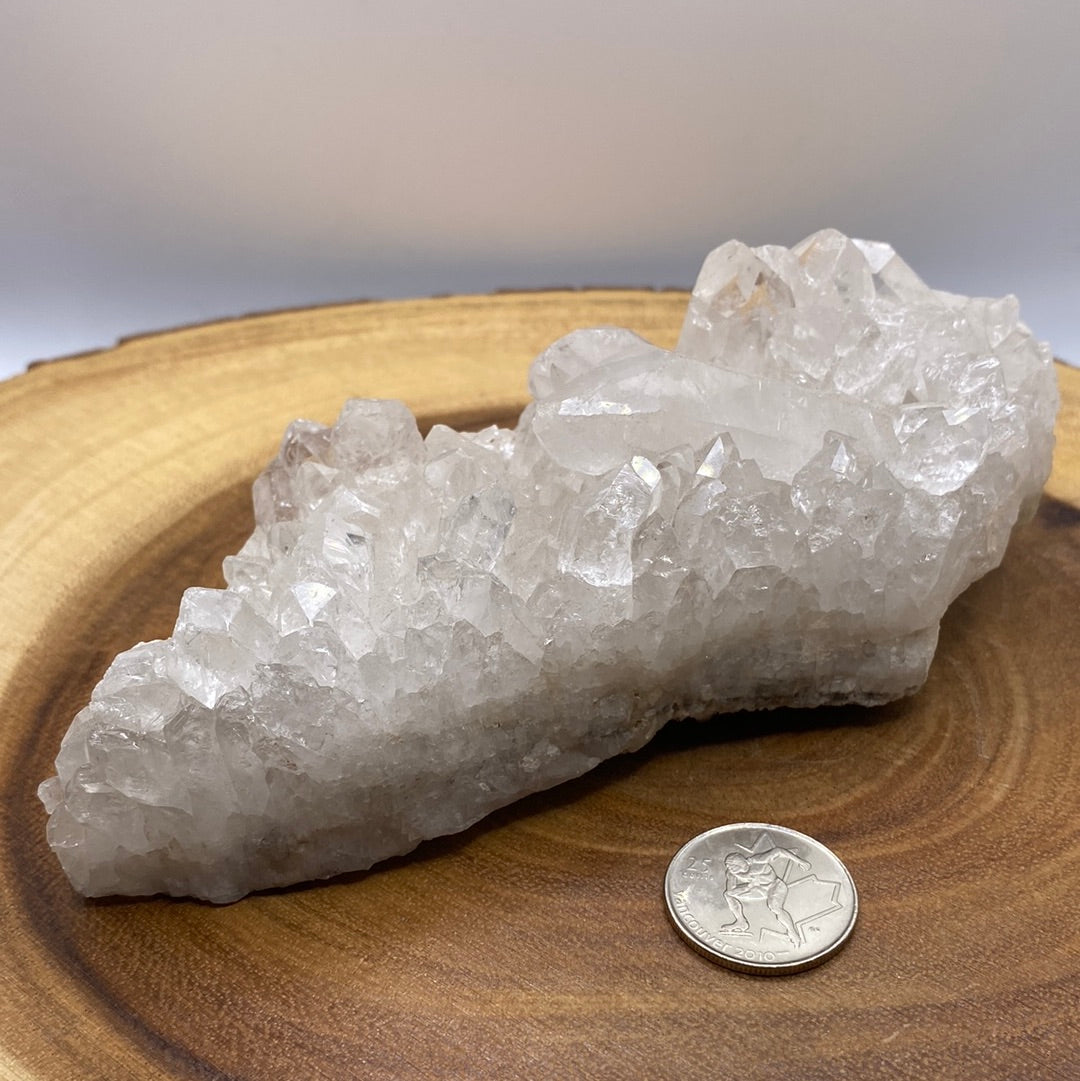 A beautiful arrangement of Clear Quartz Clusters showcasing their natural formations and sparkling clarity.