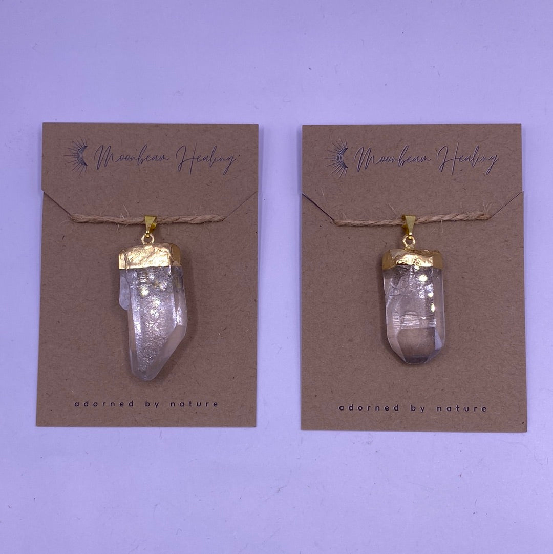 Clear Quartz Rough Cut Pendant with Gold Electro-Plating, showcasing its sparkling clarity and unique rough texture.