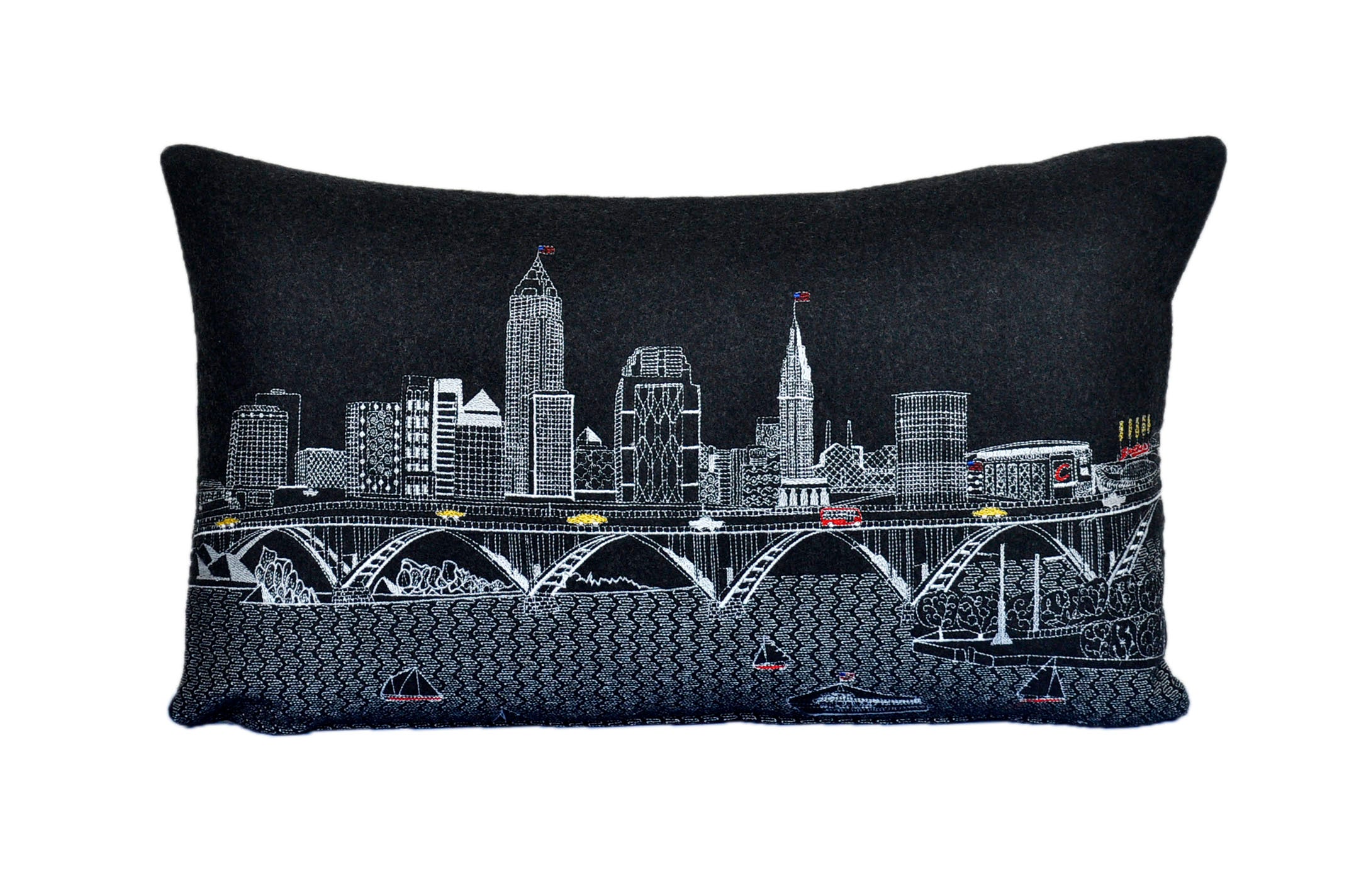 Cleveland Pillow featuring the city's skyline with vibrant colors and a red zipper at the bottom.