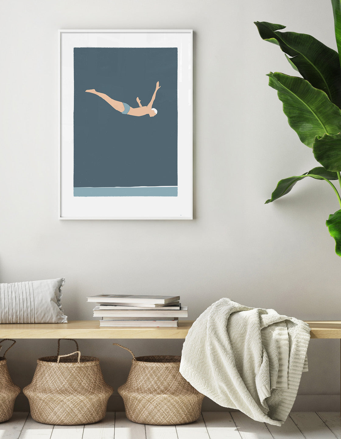 Minimalistic graphic art print of a diver cliff diving in bold blue hues, creating a serene atmosphere.