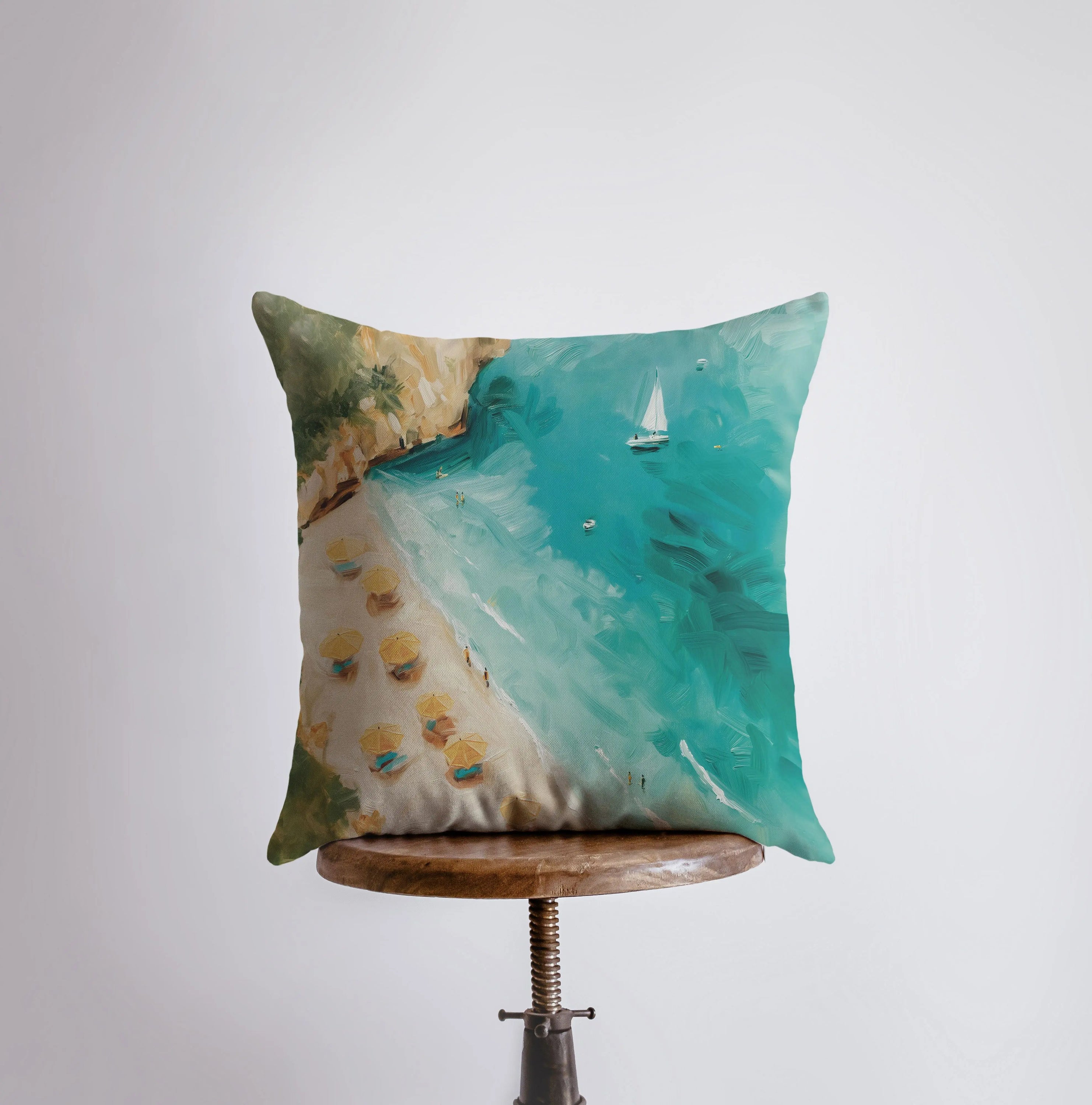 Cliffside Beach throw pillow featuring a coastal design, available in various sizes, made from a cotton/polyester blend with a concealed zipper.