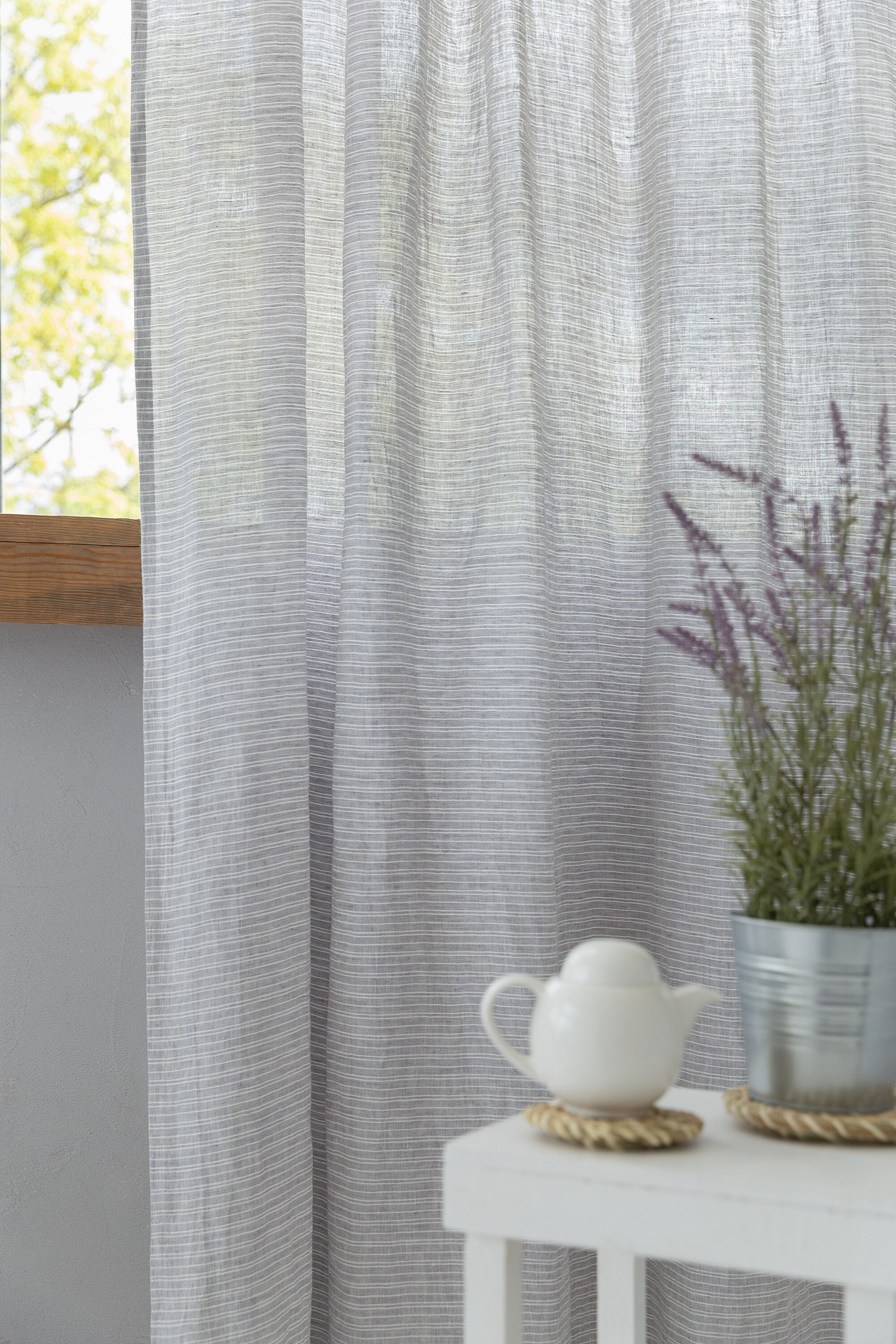 Cloudy Grey Stripe linen curtain with pleating tape and crown, showcasing elegant design and natural fabric texture.