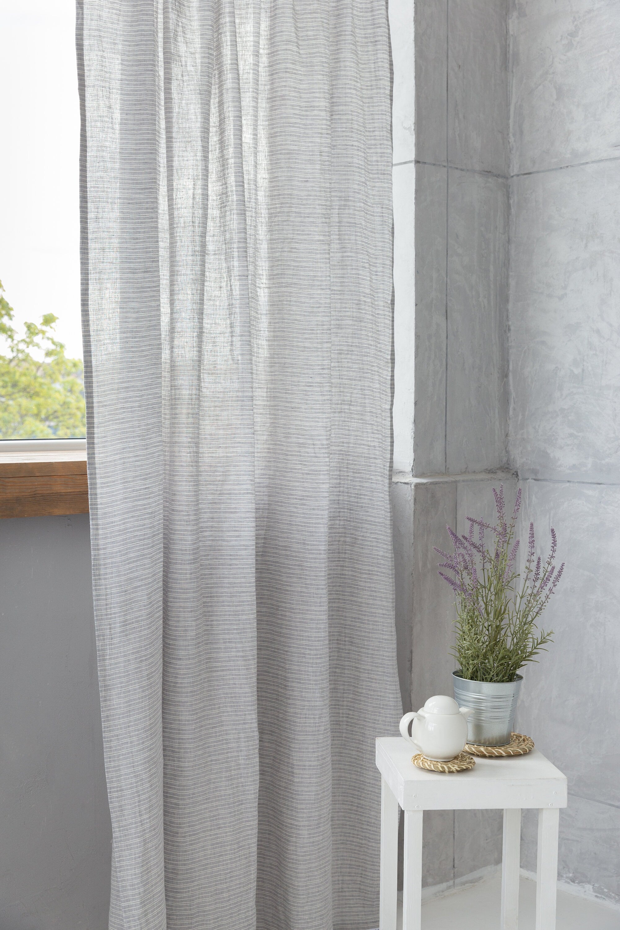 Cloudy Grey Stripe linen curtain with pleating tape and crown, showcasing elegant design and natural fabric texture.