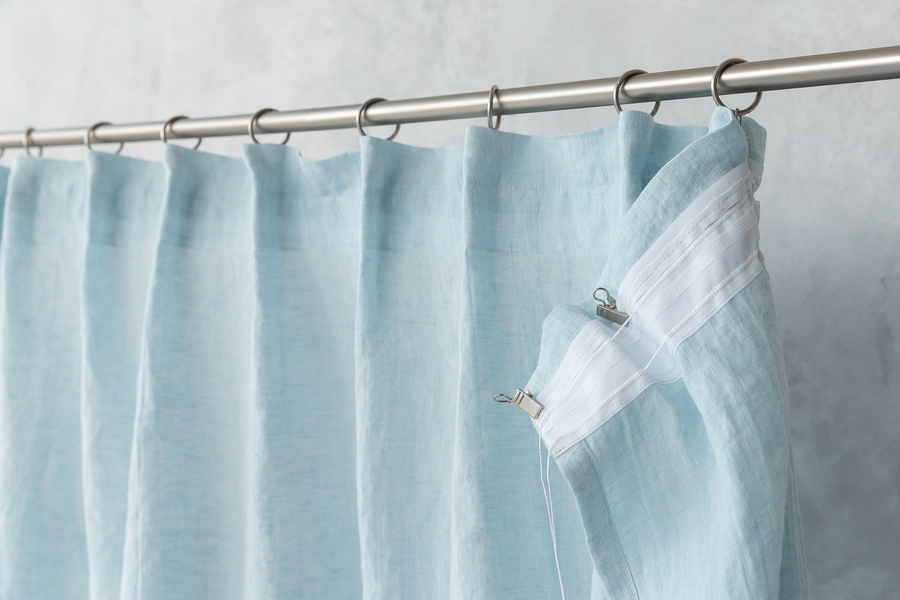 Cloudy Grey Stripe linen curtain with pleating tape and crown, showcasing elegant design and natural fabric texture.