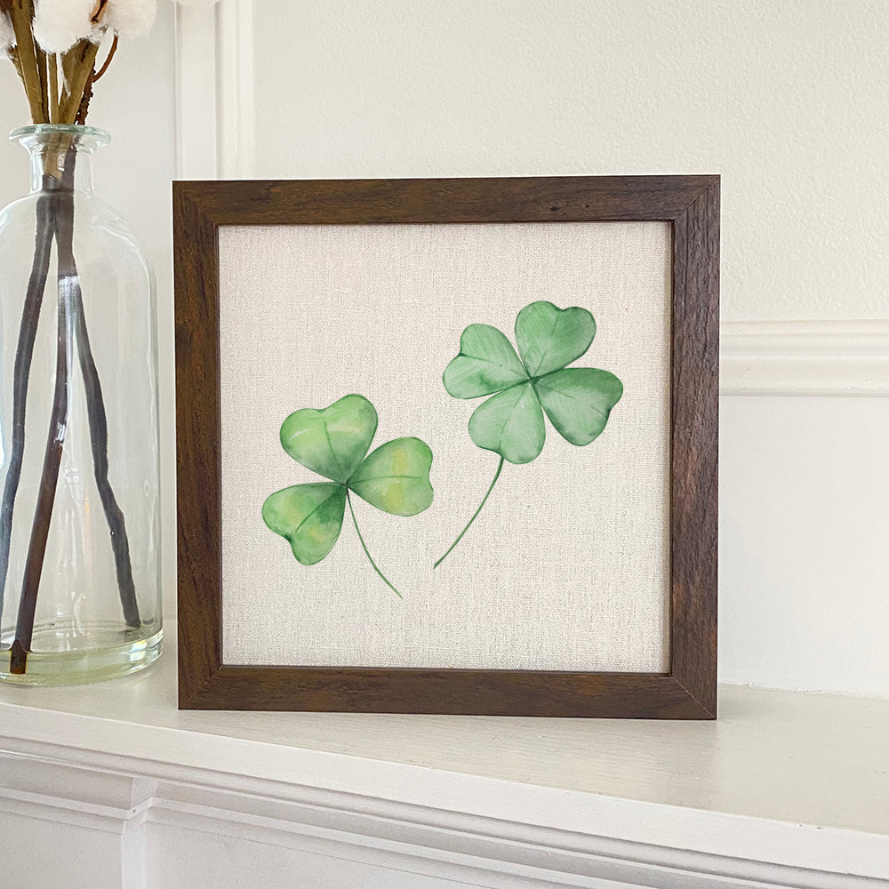 Clover Pair - Framed Sign with a stylish wood frame and linen-look background, perfect for shelf or wall display.