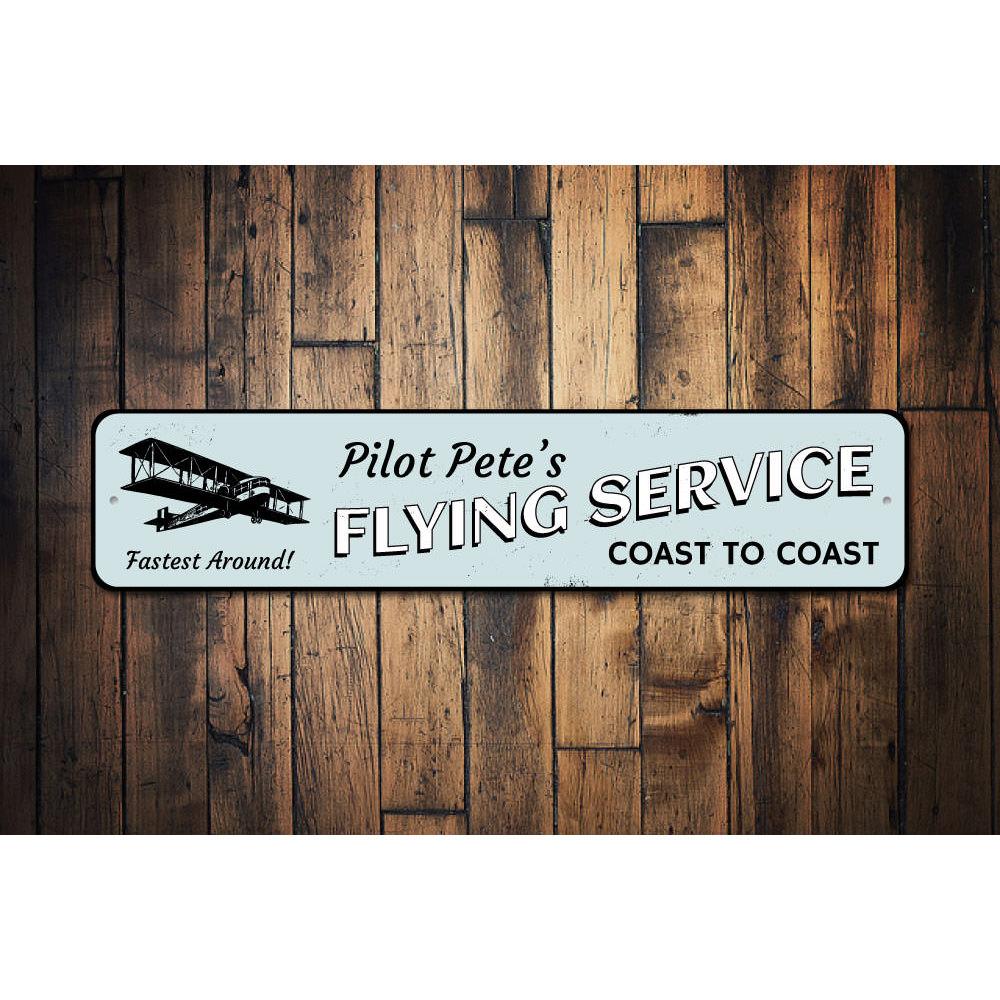 Coast to Coast Flying Service Sign made of durable aluminum, featuring customizable text and pre-drilled holes for easy mounting.