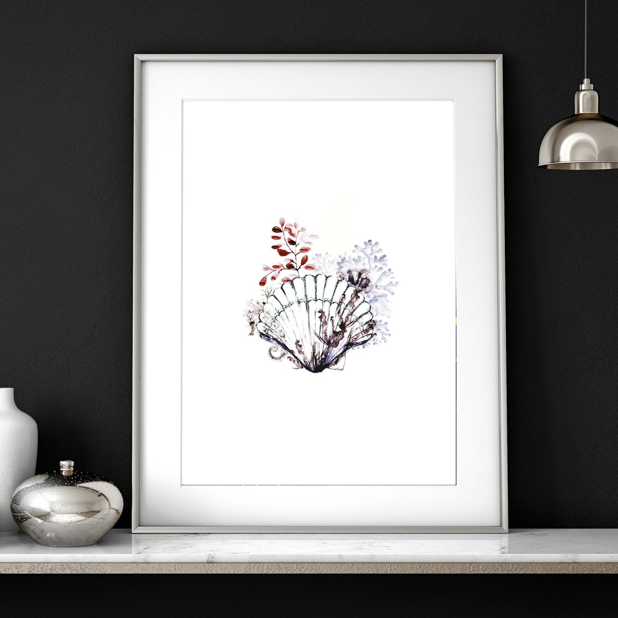 Set of 3 framed coastal wall art prints featuring beautiful watercolour seashell illustrations in soothing colors.