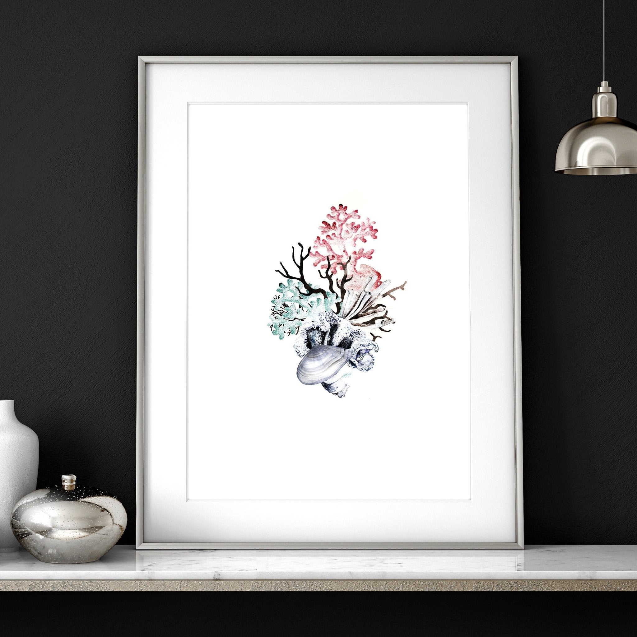 Set of 3 framed coastal wall art prints featuring beautiful watercolour seashell illustrations in soothing colors.