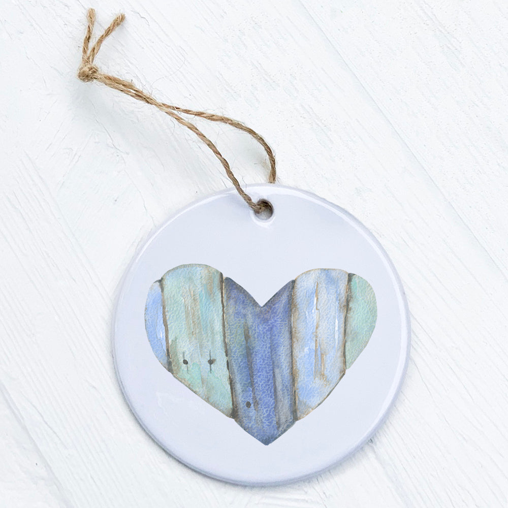 Coastal Wood Heart ornament made of high-quality porcelain with a glossy finish, featuring a vibrant coastal design.