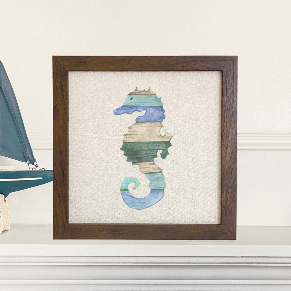 Coastal Wood Seahorse framed sign with a natural linen-style background, perfect for shelf or wall display.