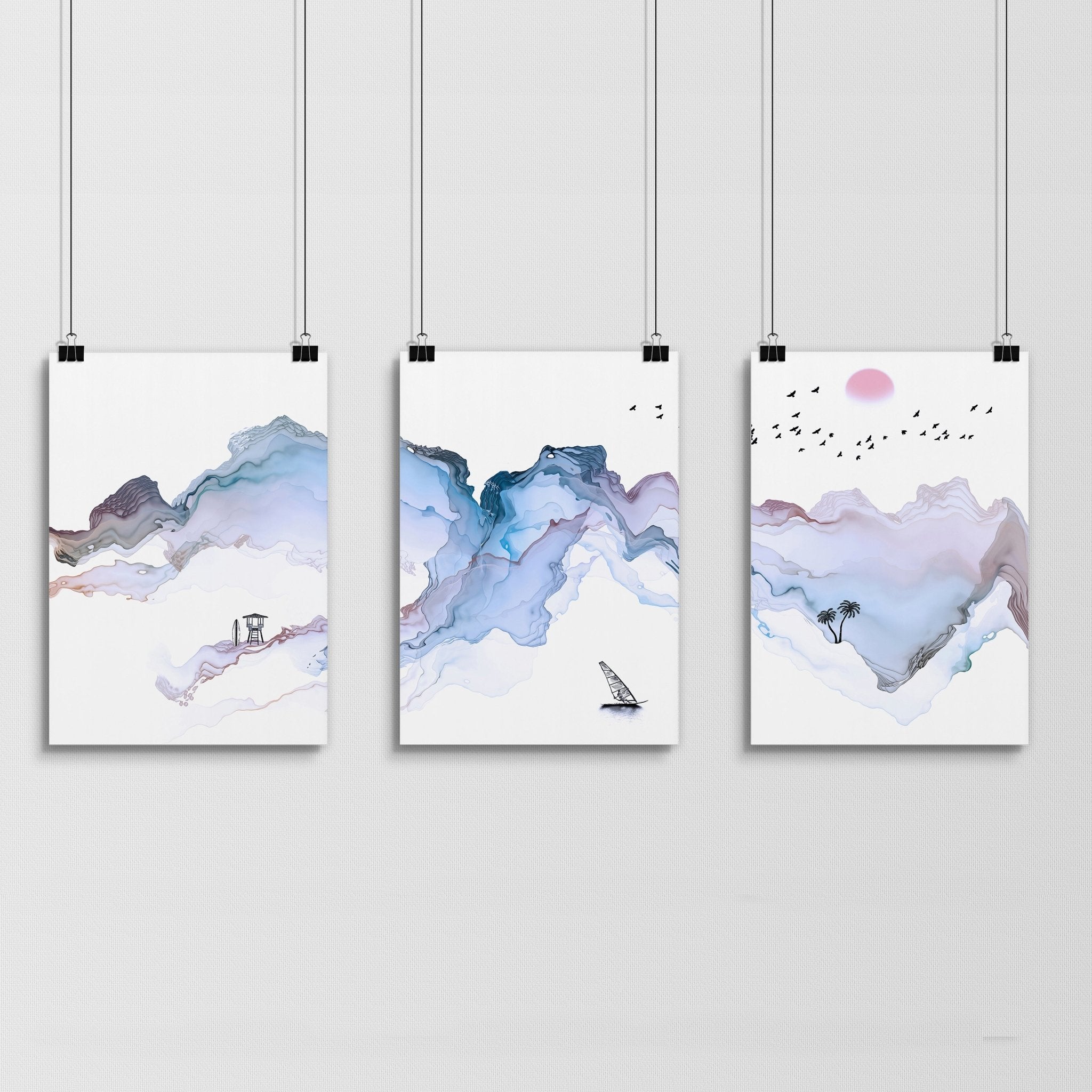 Set of 3 wall art prints featuring serene beach landscapes in pastel blue watercolor style, perfect for coastal-themed decor.