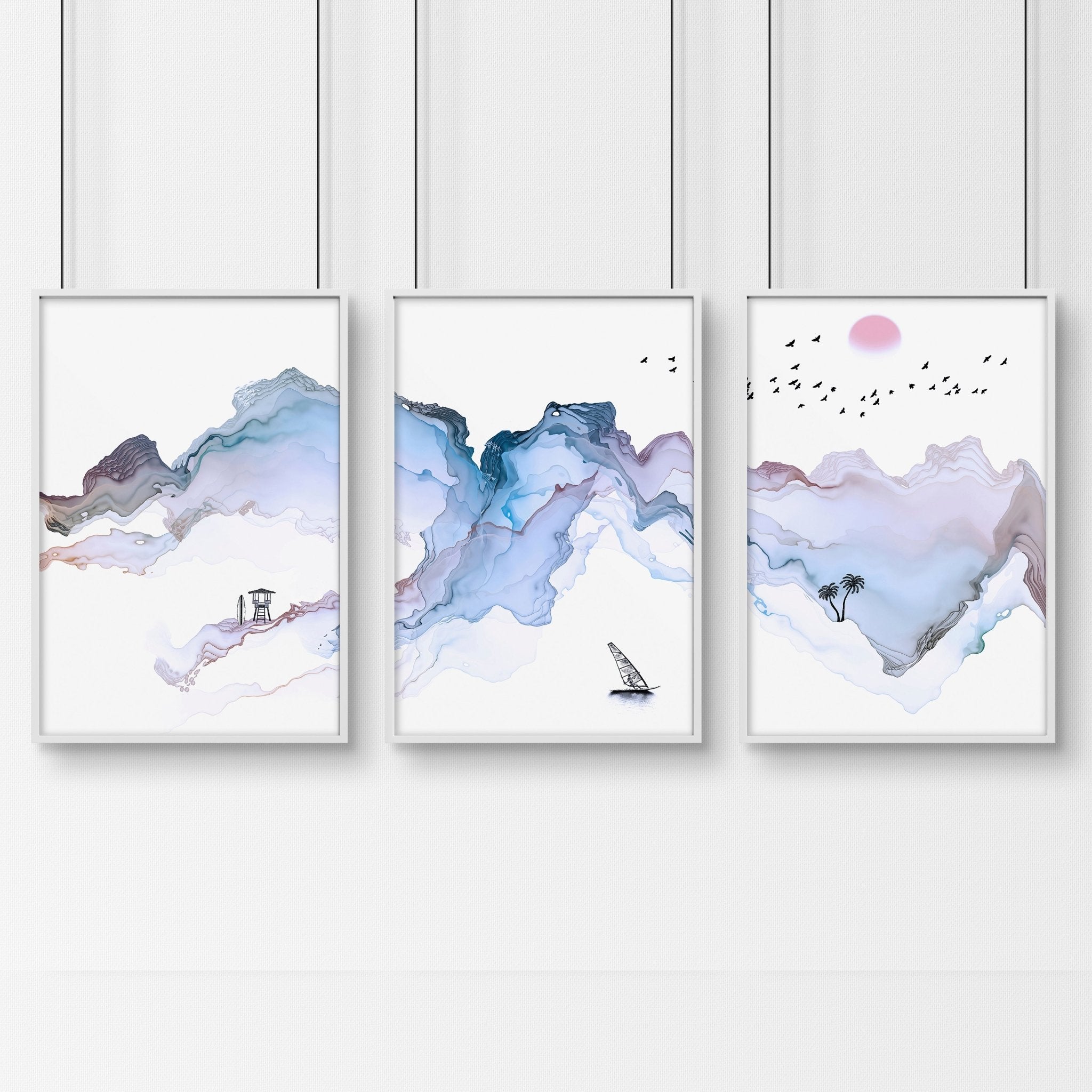 Set of 3 wall art prints featuring serene beach landscapes in pastel blue watercolor style, perfect for coastal-themed decor.