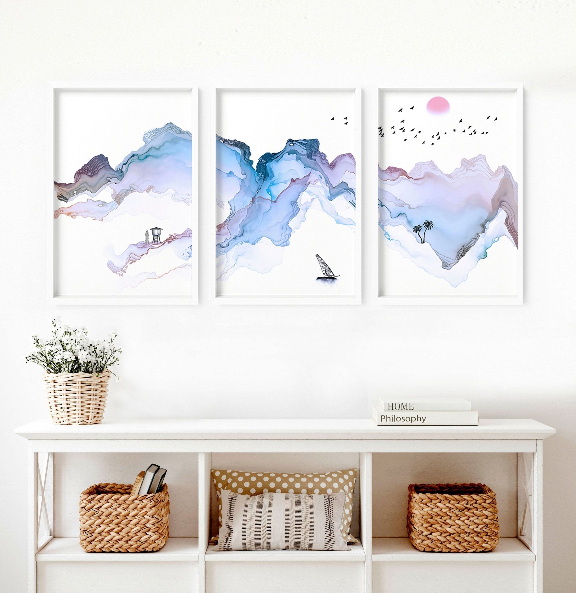 Set of 3 wall art prints featuring serene beach landscapes in pastel blue watercolor style, perfect for coastal-themed decor.