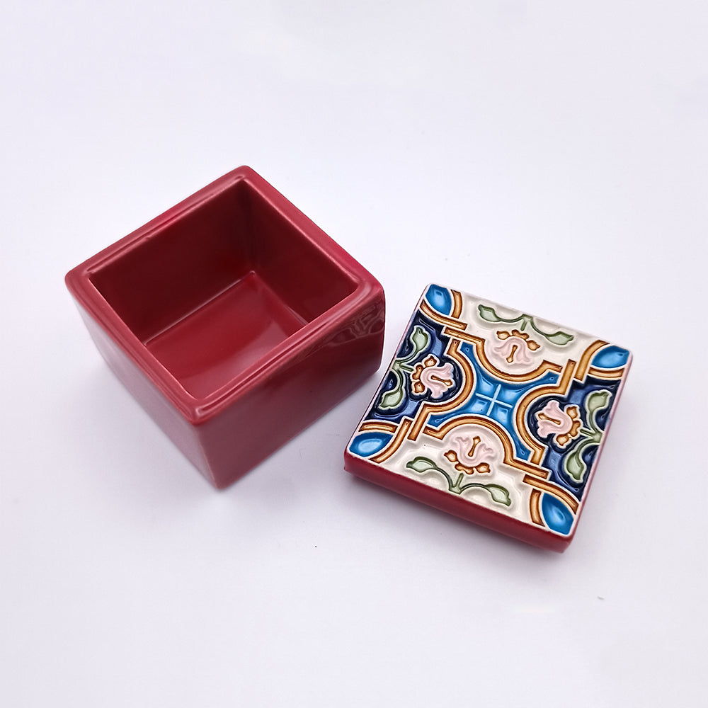 A beautifully crafted Coimbra Ceramic Box featuring intricate designs and vibrant colors, perfect for home decor.