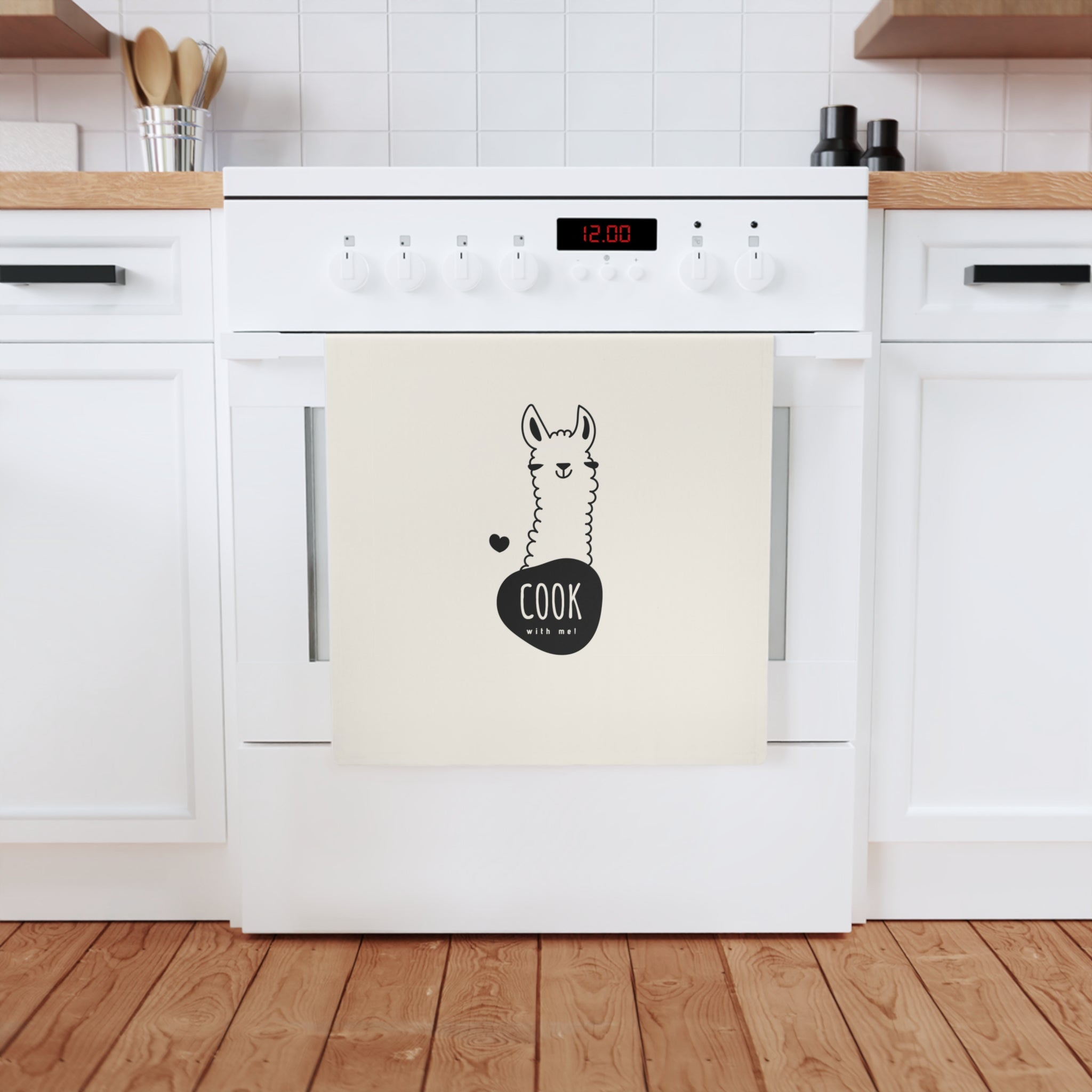 Cute llama cotton tea towel with 'cook with me' text, made from 100% organic cotton, measuring 50 x 70 cm.