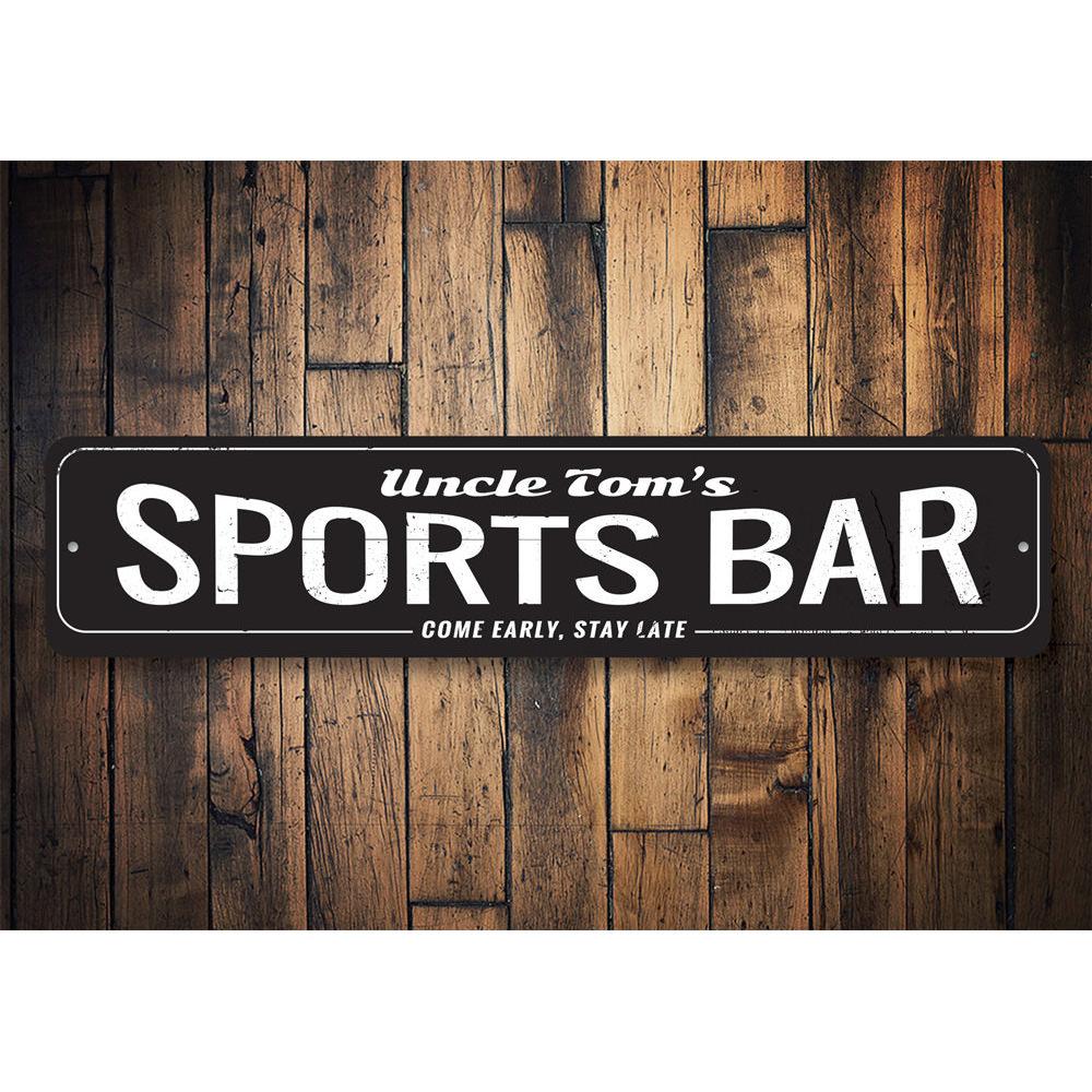 Come Early Stay Late Sports Bar Sign made of high-quality aluminum, featuring a humorous and inviting design perfect for game rooms and man caves.