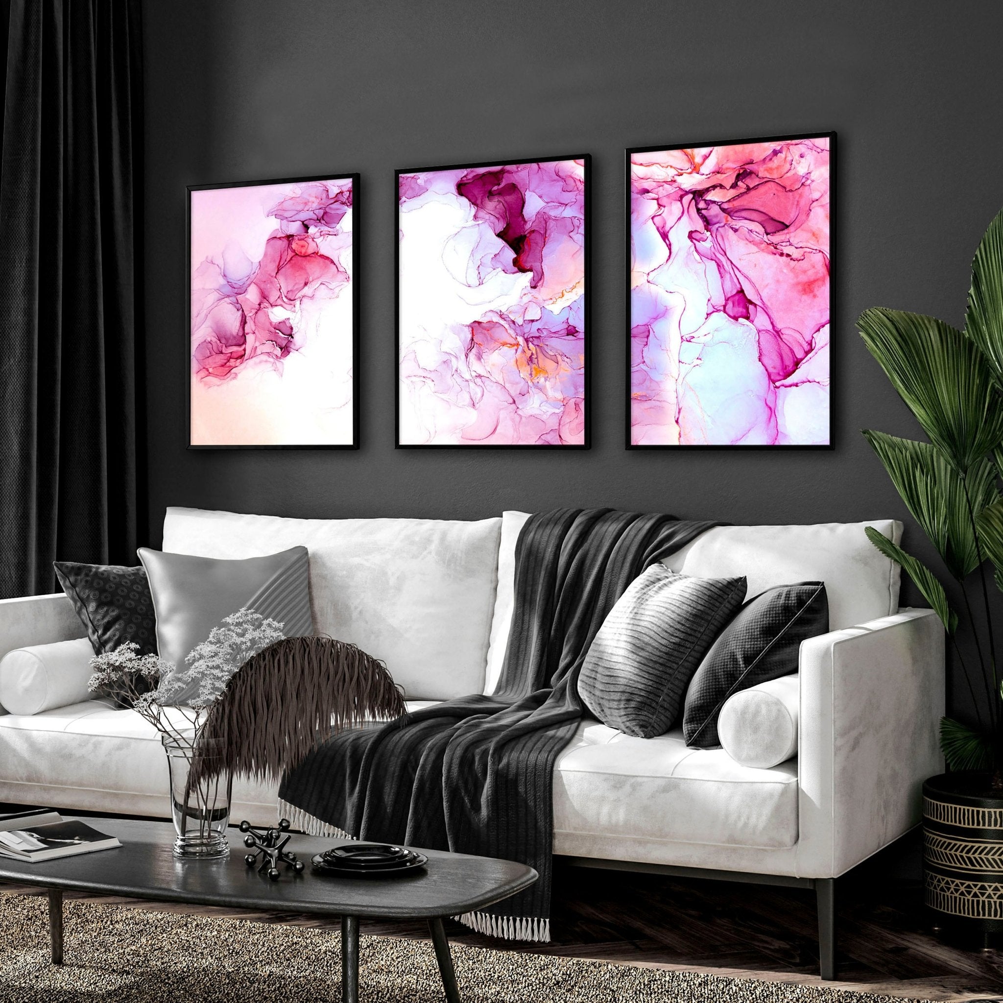 Set of 3 contemporary wall art prints featuring vibrant magenta alcohol ink designs, perfect for home or office decor.