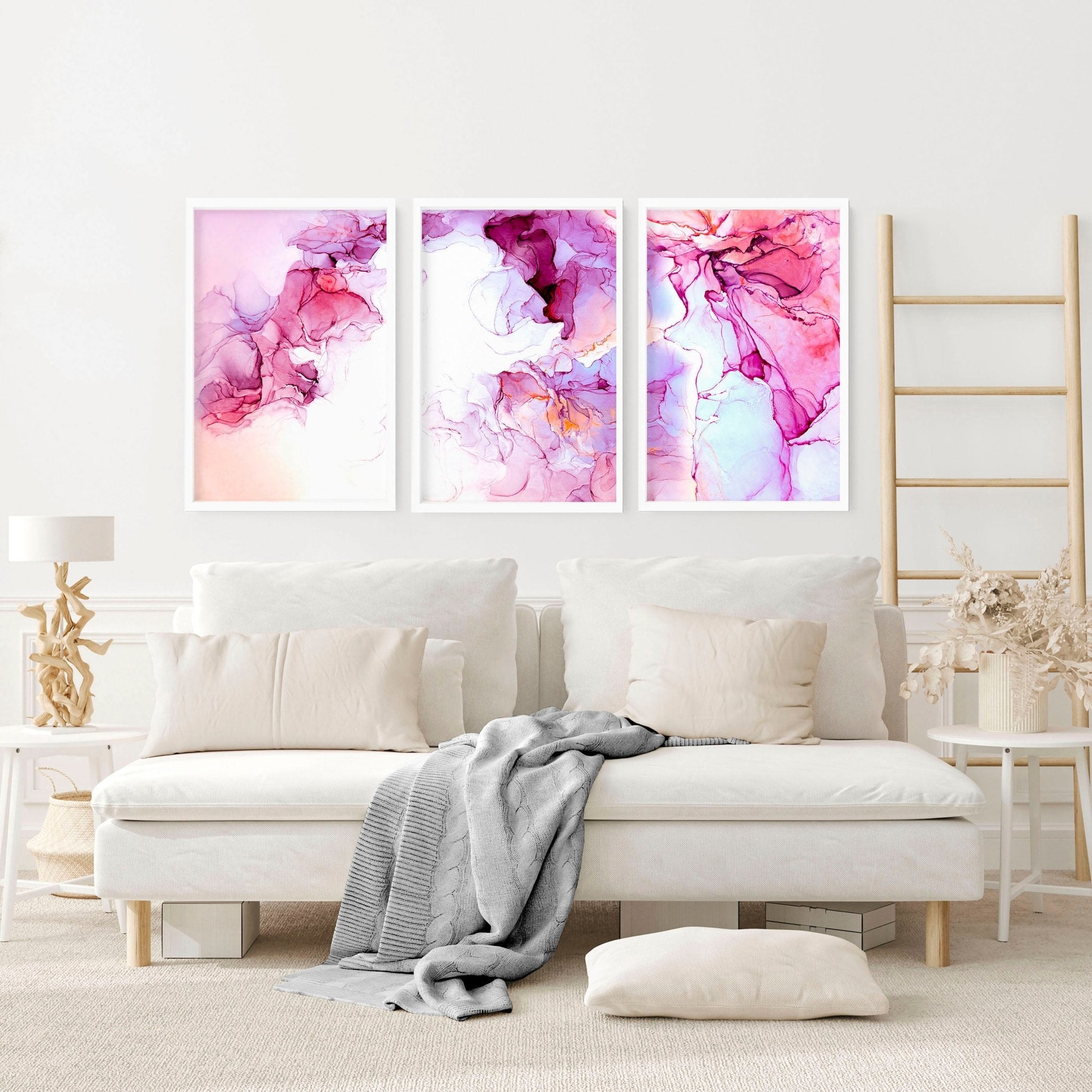 Set of 3 contemporary wall art prints featuring vibrant magenta alcohol ink designs, perfect for home or office decor.