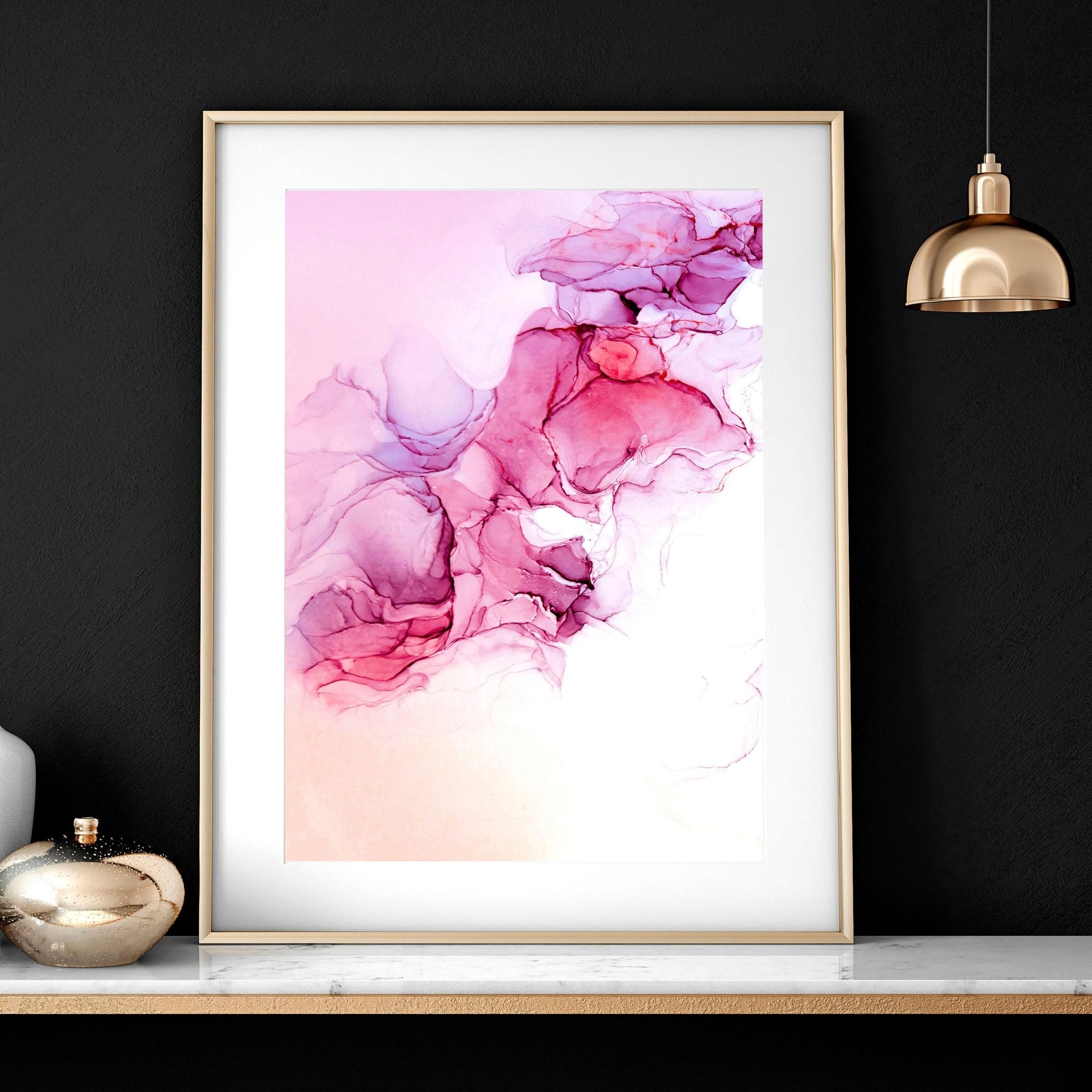 Set of 3 contemporary wall art prints featuring vibrant magenta alcohol ink designs, perfect for home or office decor.