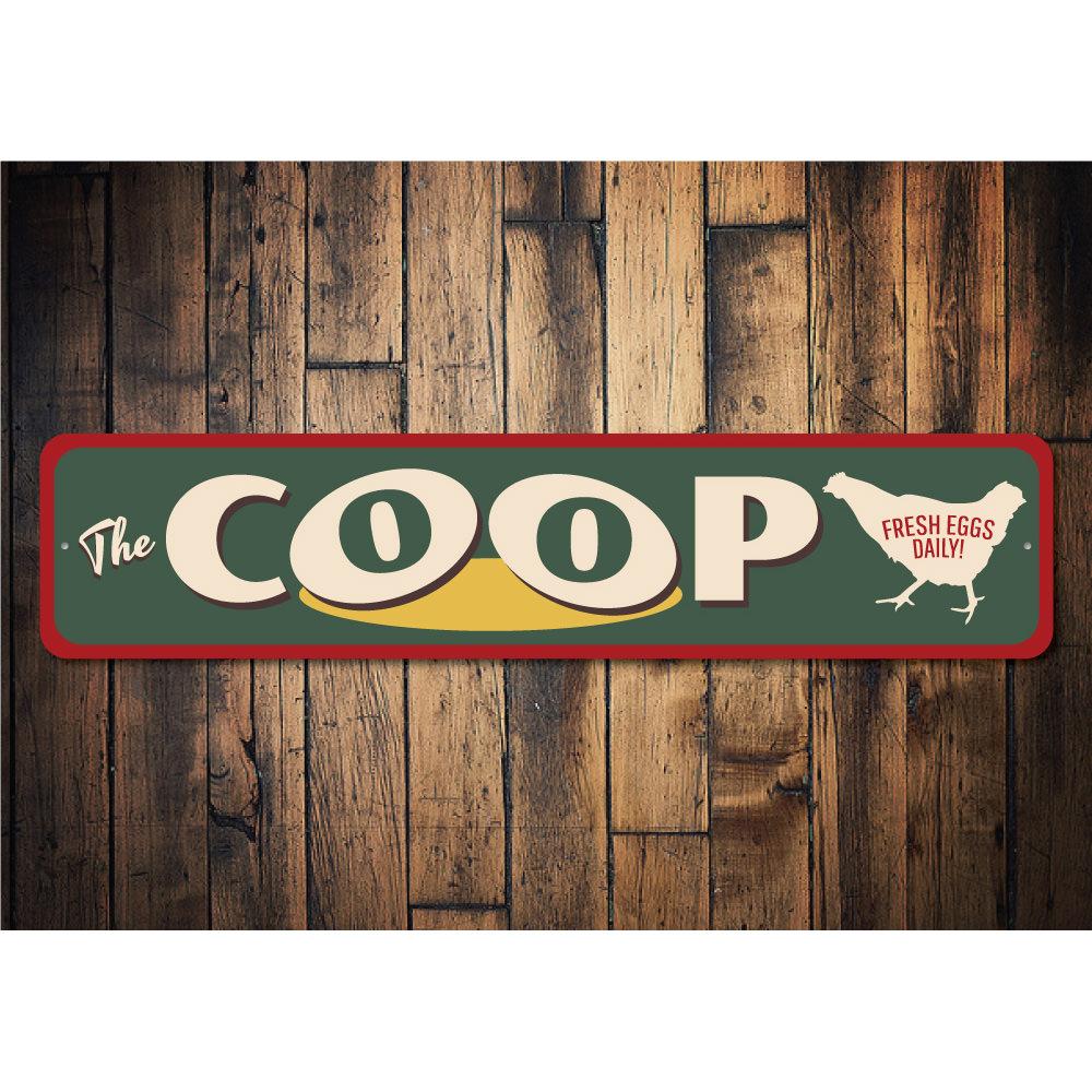 A beautifully crafted Coop Sign made of high-quality aluminum, featuring customizable text and pre-drilled holes for easy mounting.