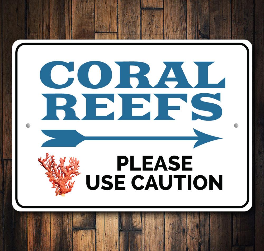 A vibrant Coral Reefs Sign made of high-quality aluminum, featuring colorful marine life and beach-themed designs, perfect for coastal decor.