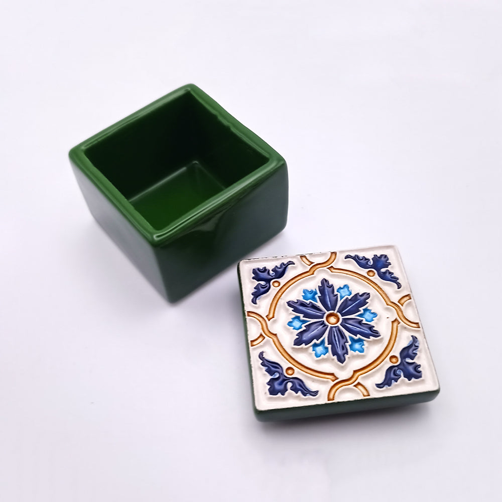 A beautifully crafted Corvo Island Ceramic Box featuring intricate designs and a glossy finish, perfect for home decor and storage.