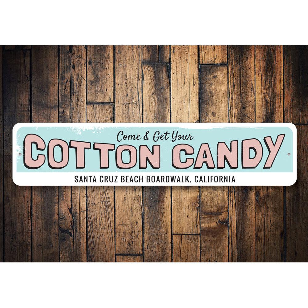 A vibrant Cotton Candy Sign made of high-quality aluminum, featuring colorful graphics and customizable text, perfect for beach-themed decor.