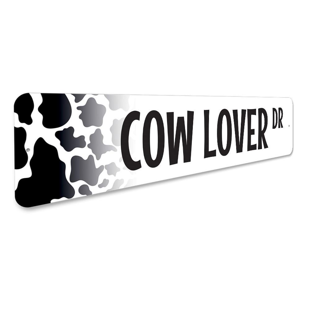 A decorative Cow Lover Street Sign made of aluminum, featuring a charming cow design, perfect for home decor.