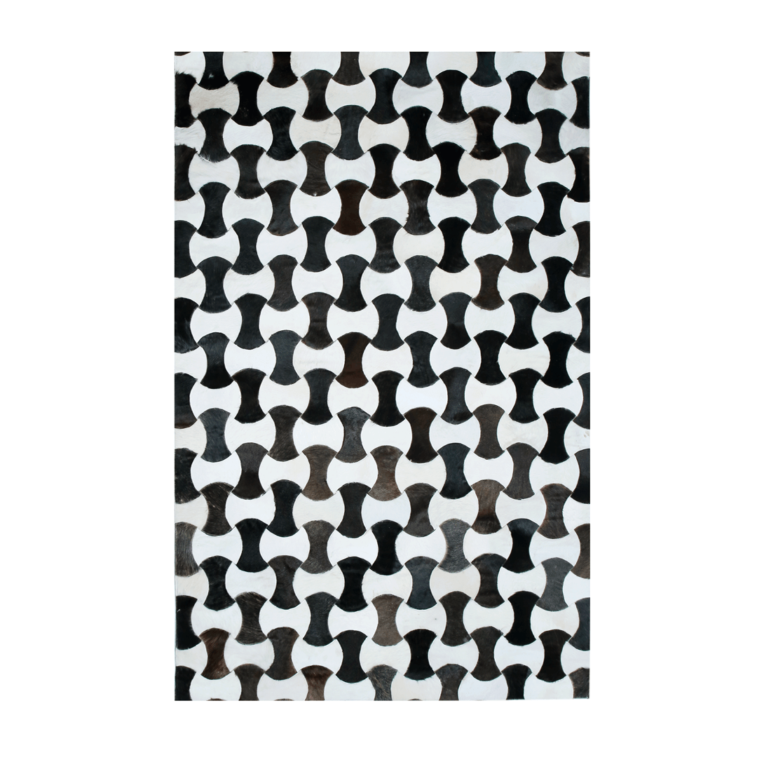 Hand-stitched cow skin rug with a modern curve pattern, showcasing natural leather texture and luxurious design.