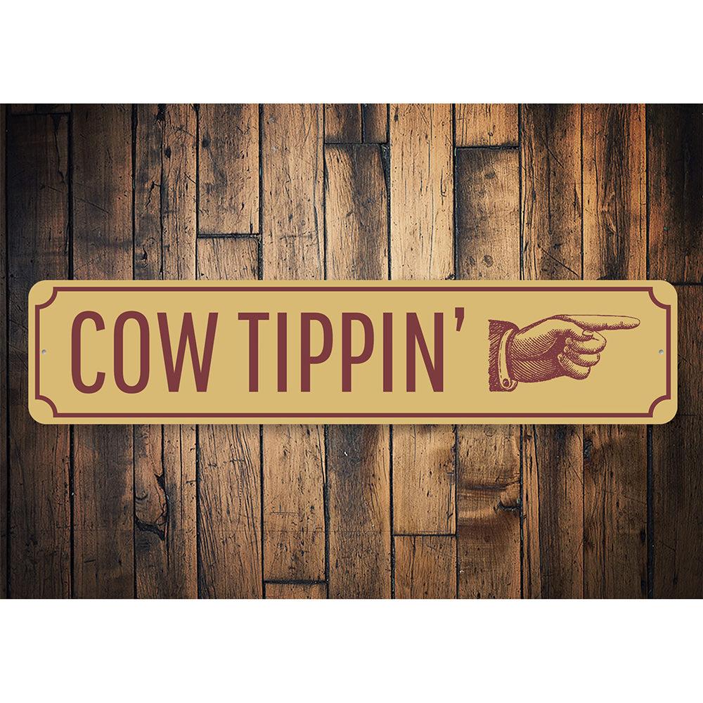 Cow Tippin Sign made of high-quality aluminum, featuring rustic design perfect for barn or farmhouse decor.