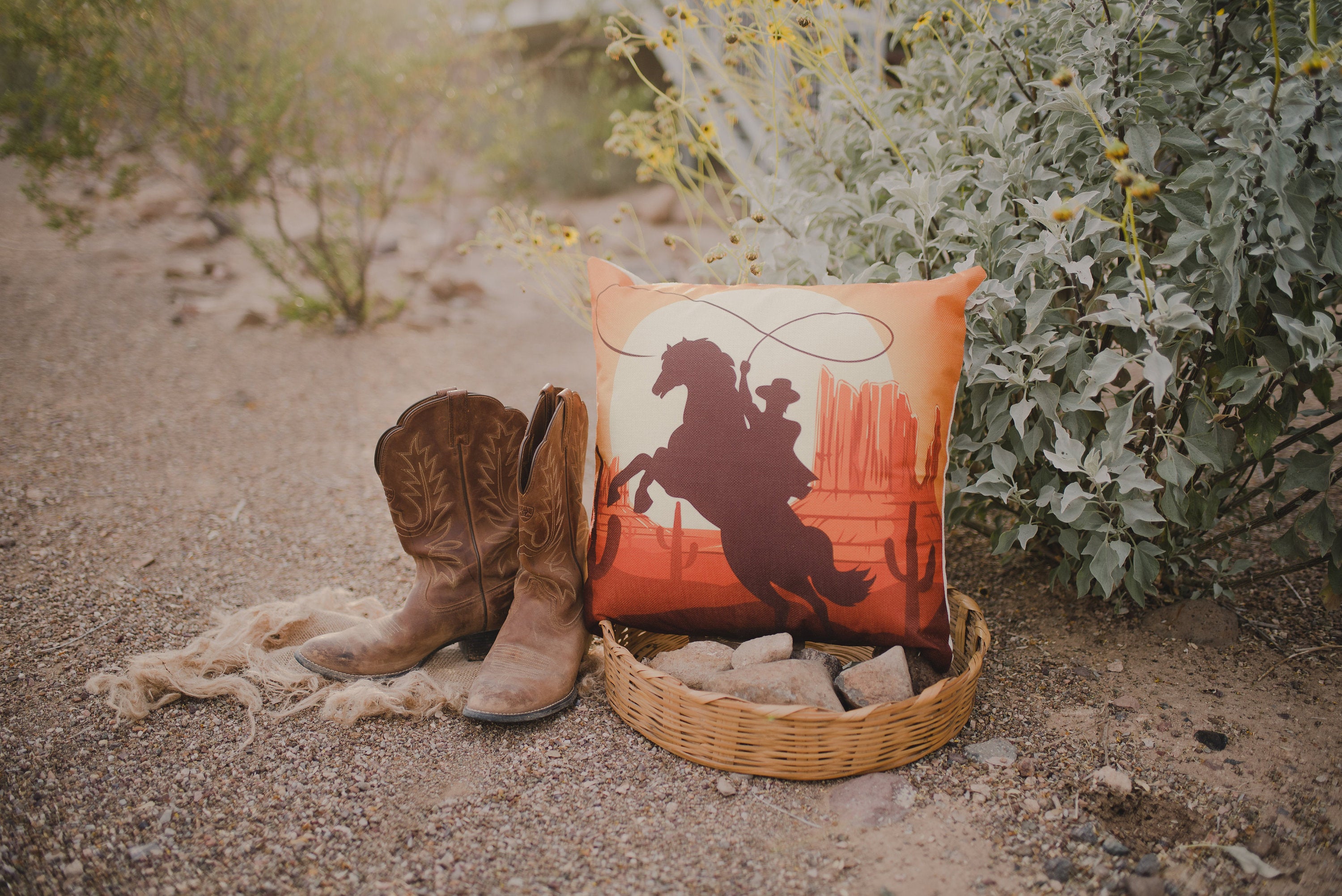 Cowboy throw pillow featuring a South West cowboy design, beige back, and concealed zipper, perfect for horse lovers and home decor.