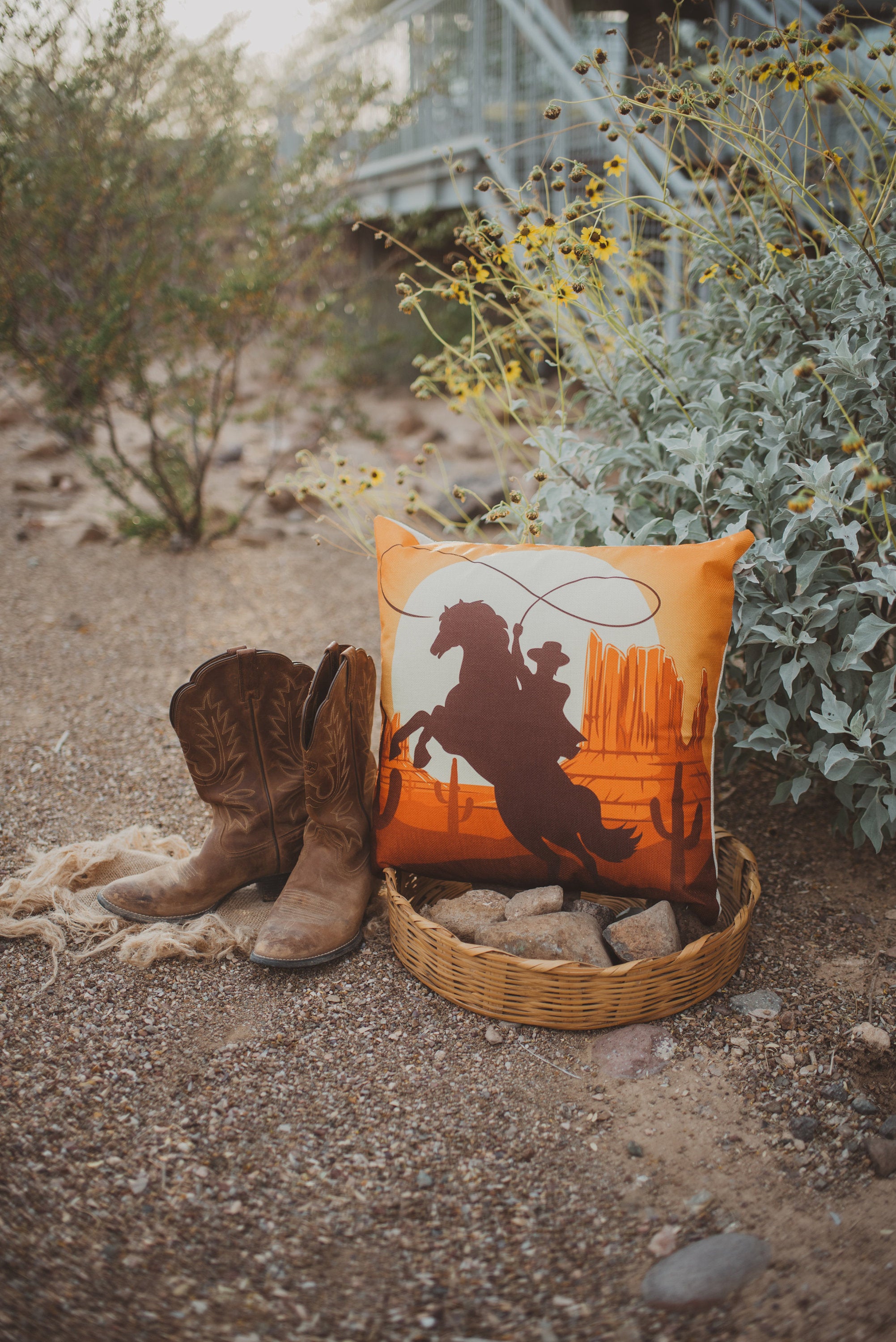 Cowboy throw pillow featuring a South West cowboy design, beige back, and concealed zipper, perfect for horse lovers and home decor.