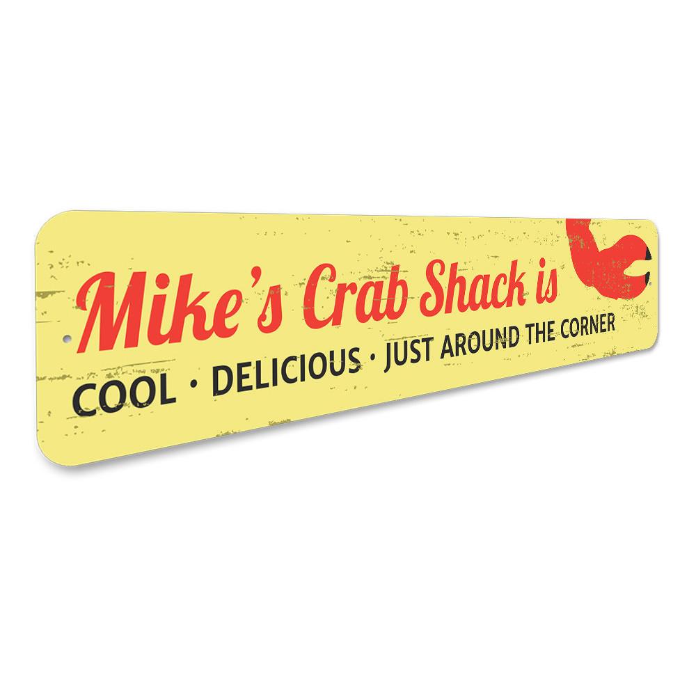 A decorative Crab Claw Sign made of high-quality aluminum, featuring a vibrant design perfect for beach-themed decor.