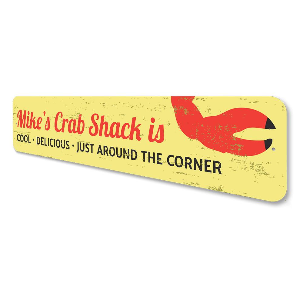 A decorative Crab Claw Sign made of high-quality aluminum, featuring a vibrant design perfect for beach-themed decor.