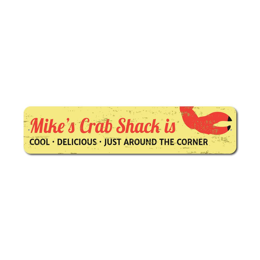 A decorative Crab Claw Sign made of high-quality aluminum, featuring a vibrant design perfect for beach-themed decor.