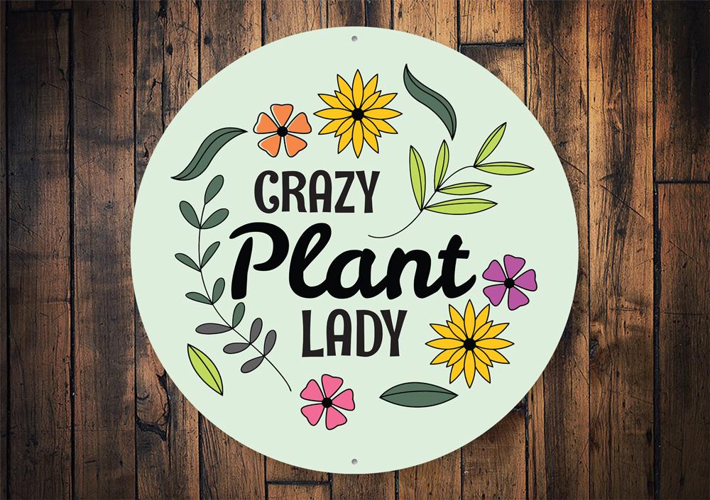 A decorative Crazy Plant Lady Sign made of high-quality aluminum, featuring vibrant colors and a charming design, perfect for plant lovers.