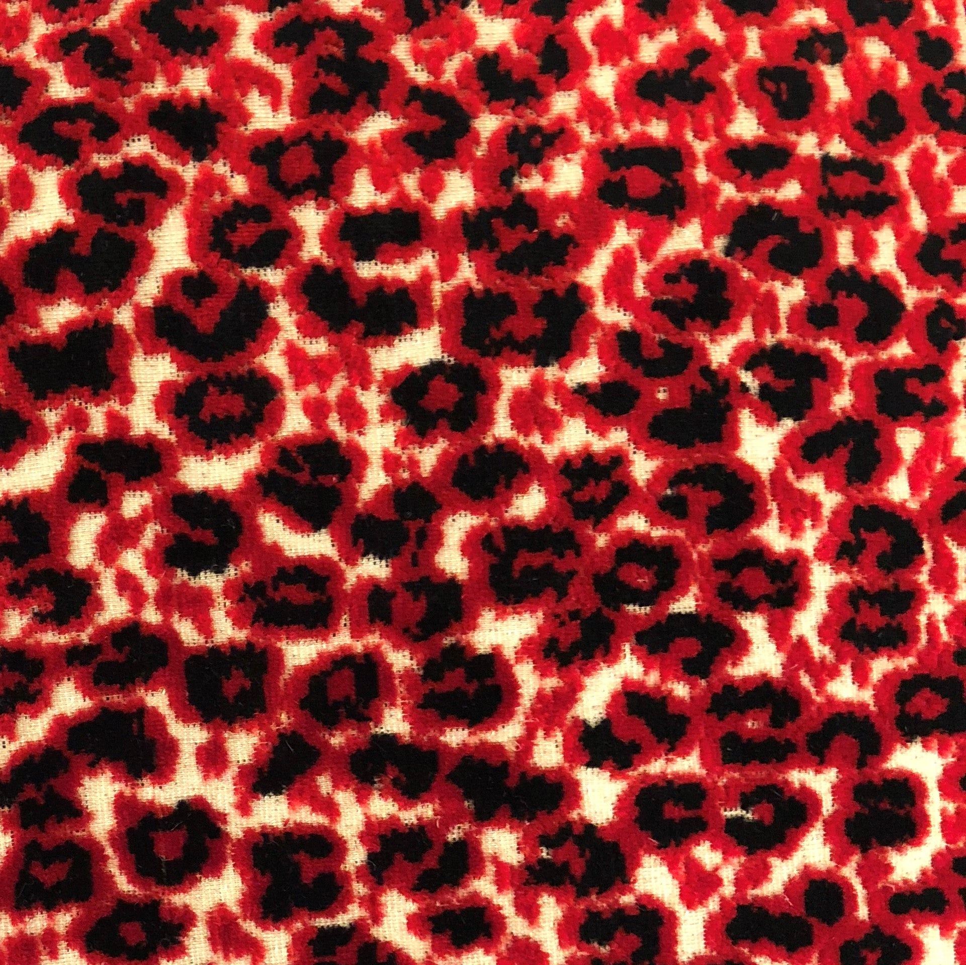 Crimson Cheetah Black and Red Luxury Throw Pillow featuring a vibrant animal motif with a soft fabric blend.