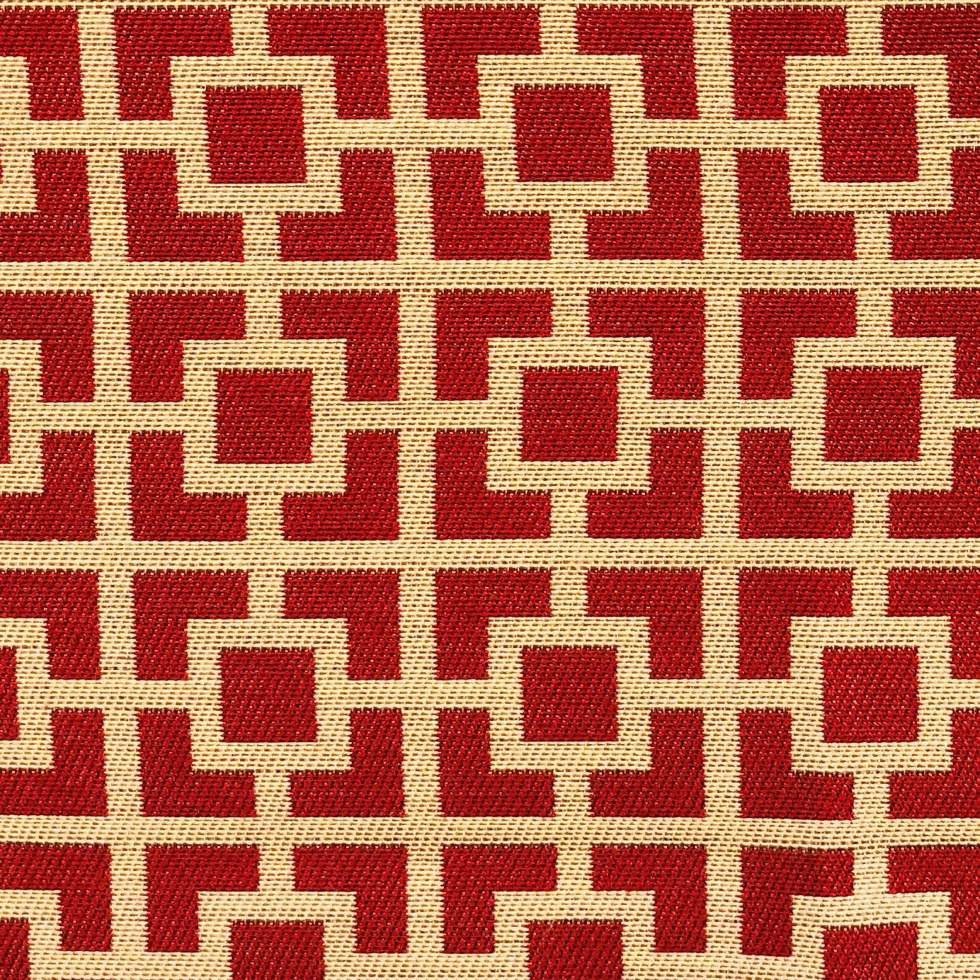 Crimson square throw pillow featuring a red and beige geometric pattern, handmade in the USA with a soft fabric blend.