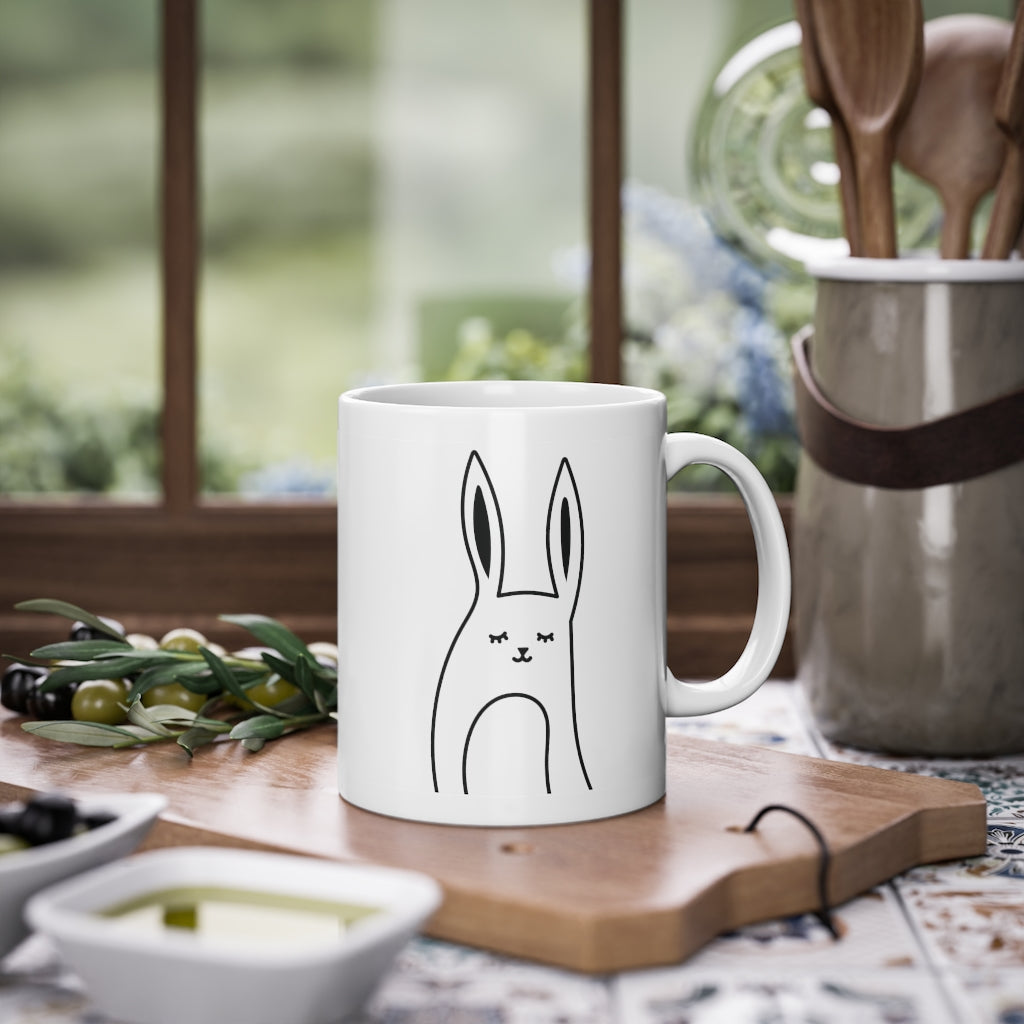 Cute Bunny Mug featuring a funny rabbit print on a glossy white ceramic base, perfect for coffee or tea.