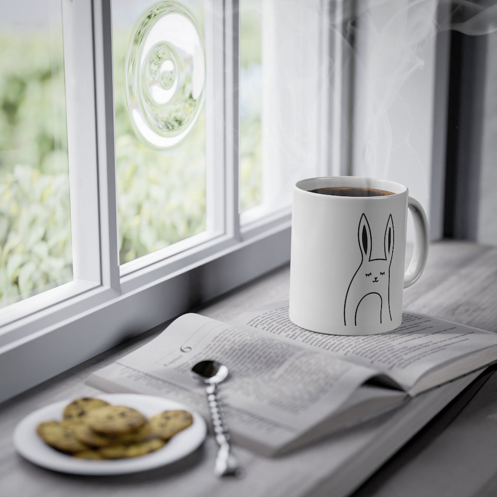 Cute Bunny Mug featuring a funny rabbit print on a glossy white ceramic base, perfect for coffee or tea.