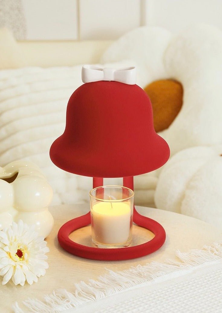 Cute whimsical bell candle warmer lamp designed for large candles, featuring a playful bell shape and warm light.